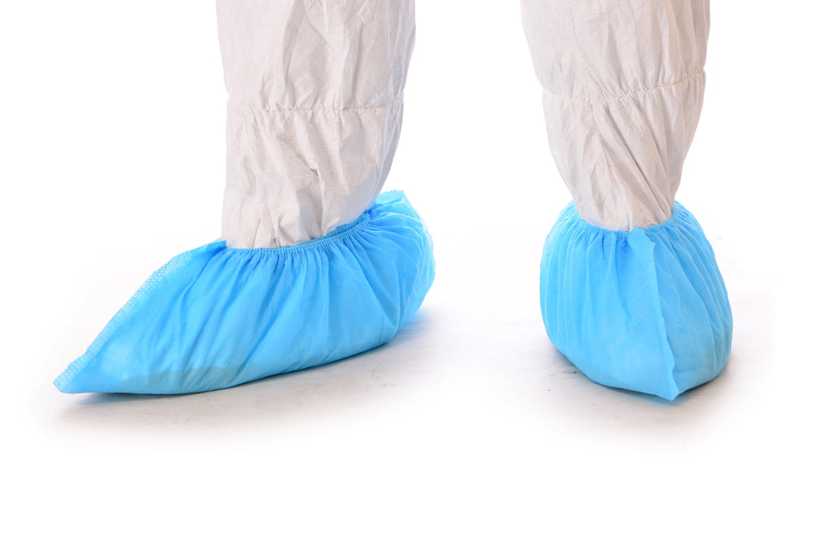 Nonwoven shoe cover cover mahine made 2 copy Integrity™ Anti-Skid Shoe Cover, Non-Woven Spunbond Polypropylene, Blue Photo